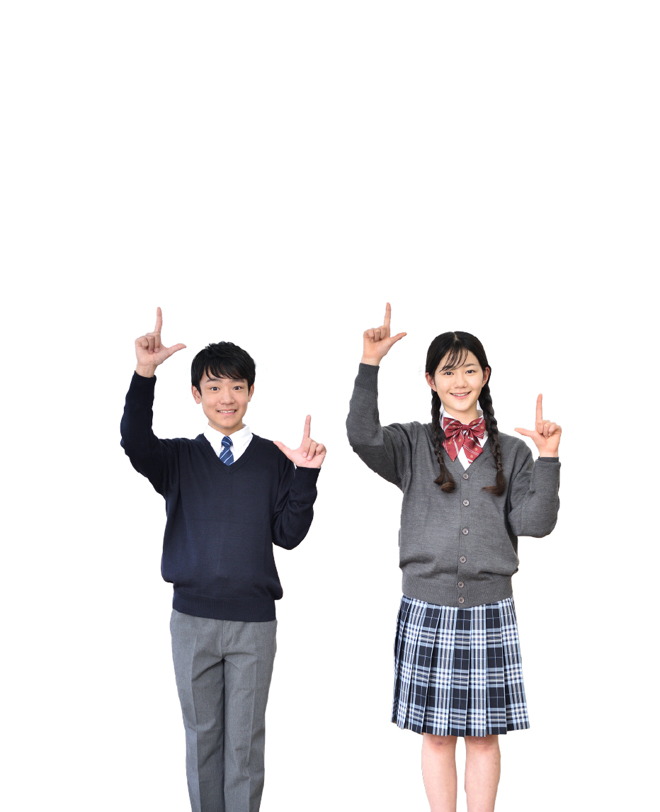 笑顔で指を差す中学生男女